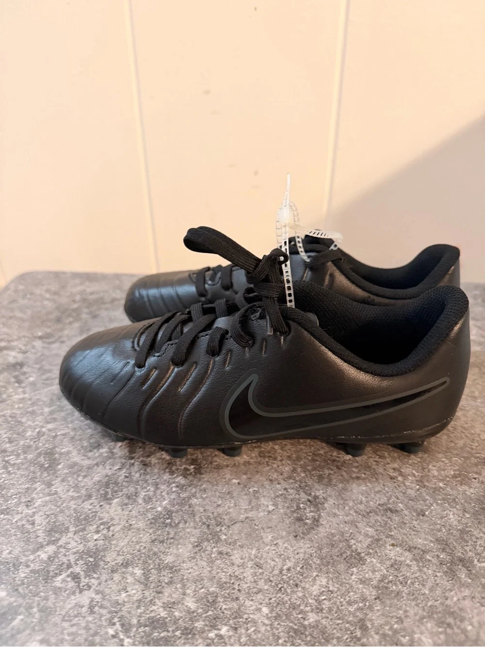 Nike Kids Black Soccer Cleats with Subtle Dark Swoosh